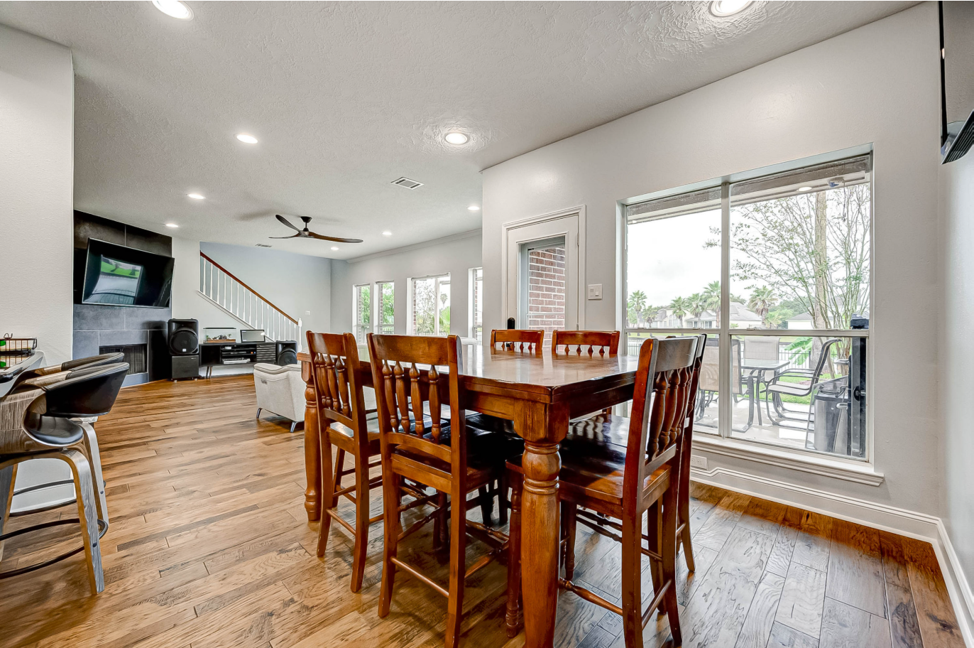 dining area connected to the remodeled open-concept living space