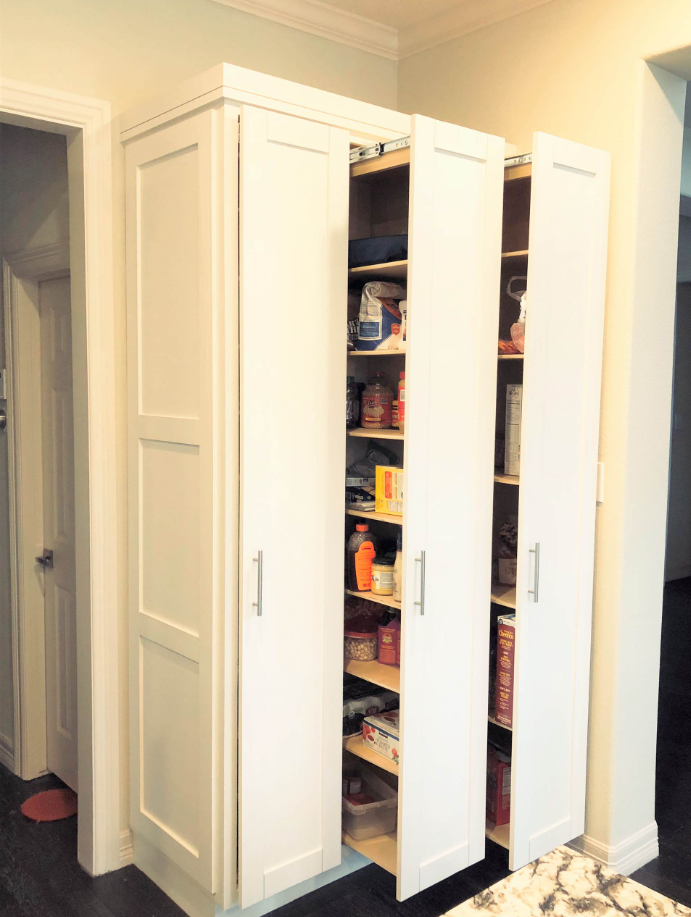 tall custom pantry cabinet with modern shaker doors and pull-out storage