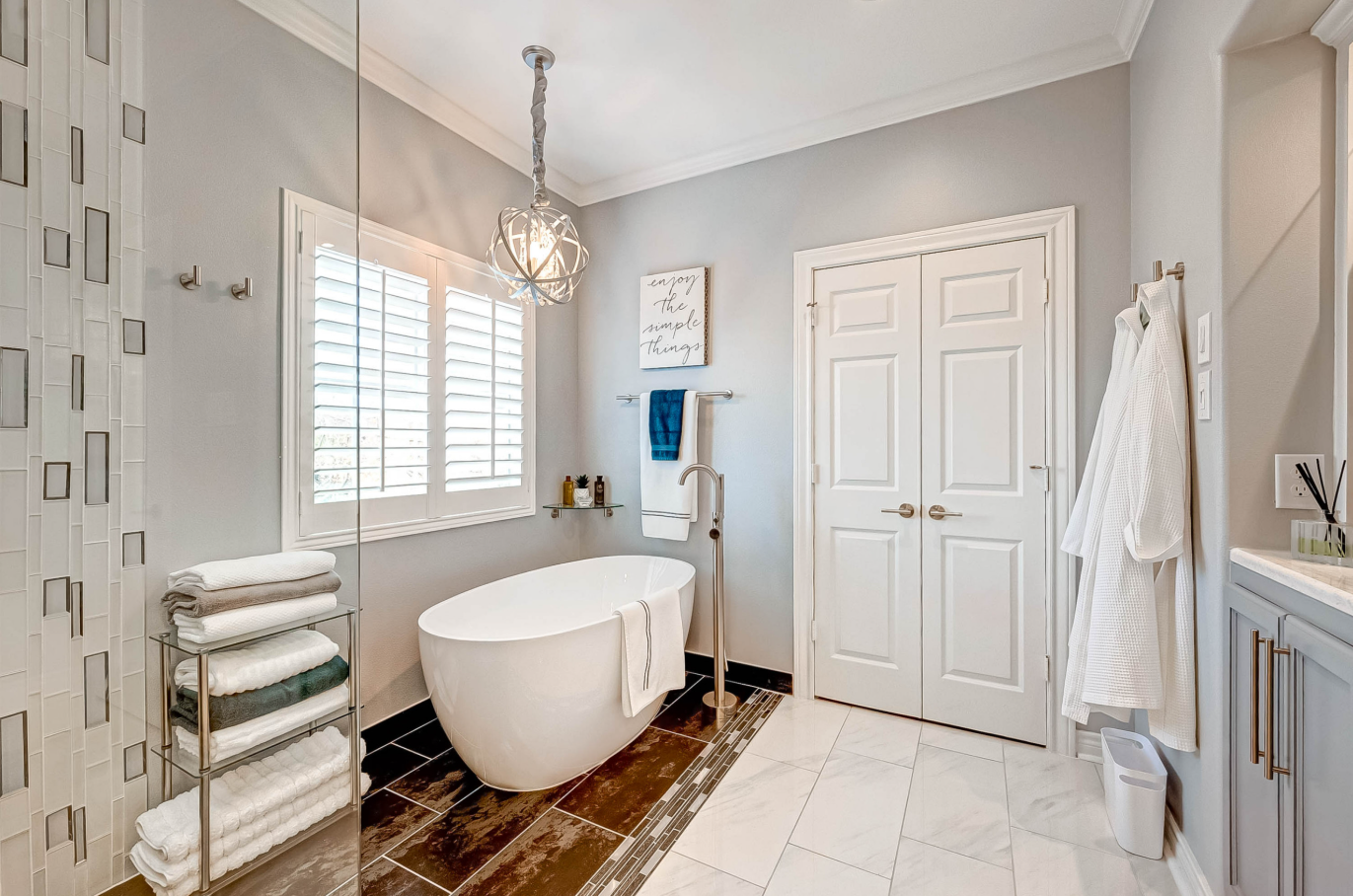 freestanding bathtub area created from the previous shower and tub layout